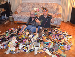 Debbie and Vic Ceder with over 1000 chocolate bar wrappers