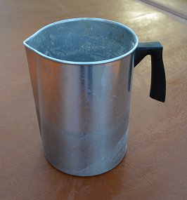 Metal pouring pitcher
